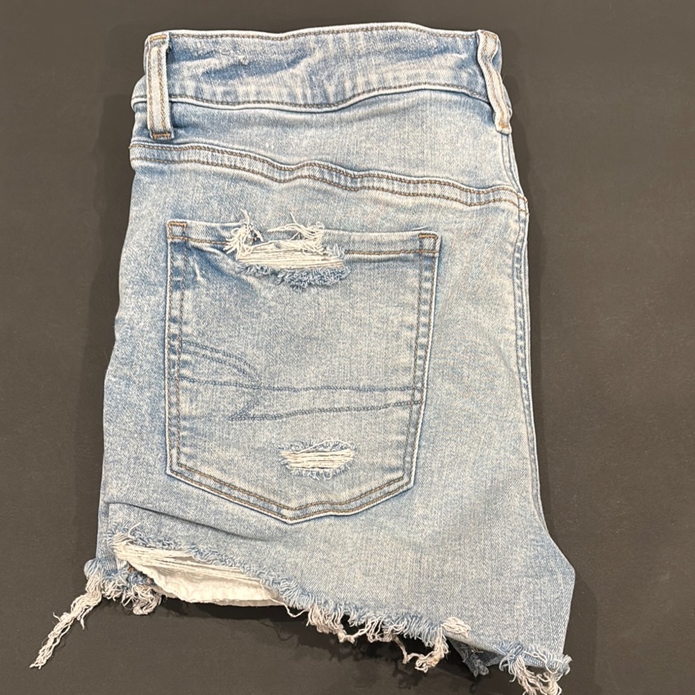 American Eagle Next Level High-Waisted Ripped Denim Shorts
Size 12